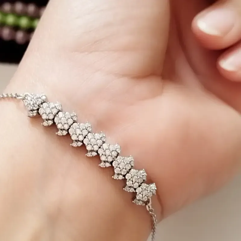 دستبند نقره زنانه عیار 925 طرح جواهری روکش طلا سفید وزن 4.49 گرم