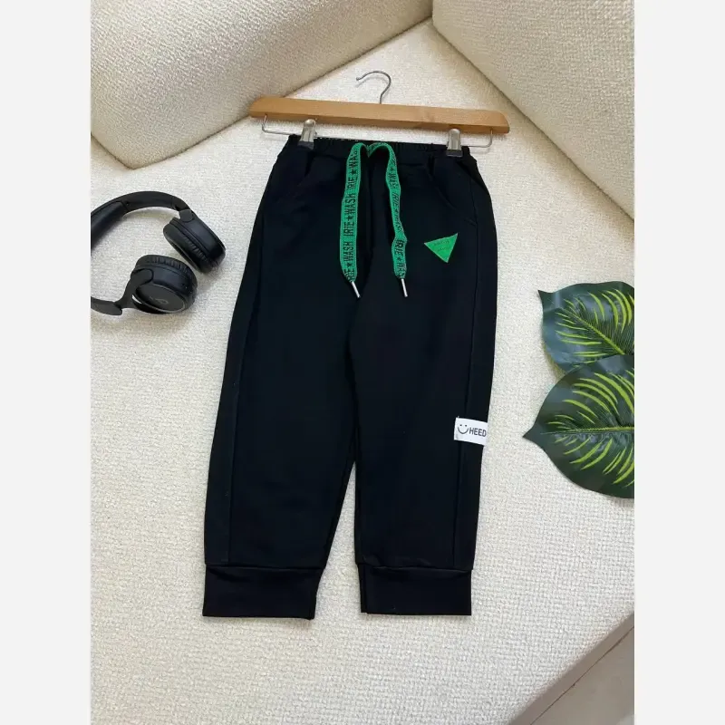 شلوار اسلش بچگانه وارداتی مشکی دورس مناسب 3 تا 8 سال سایز 110 تا 170