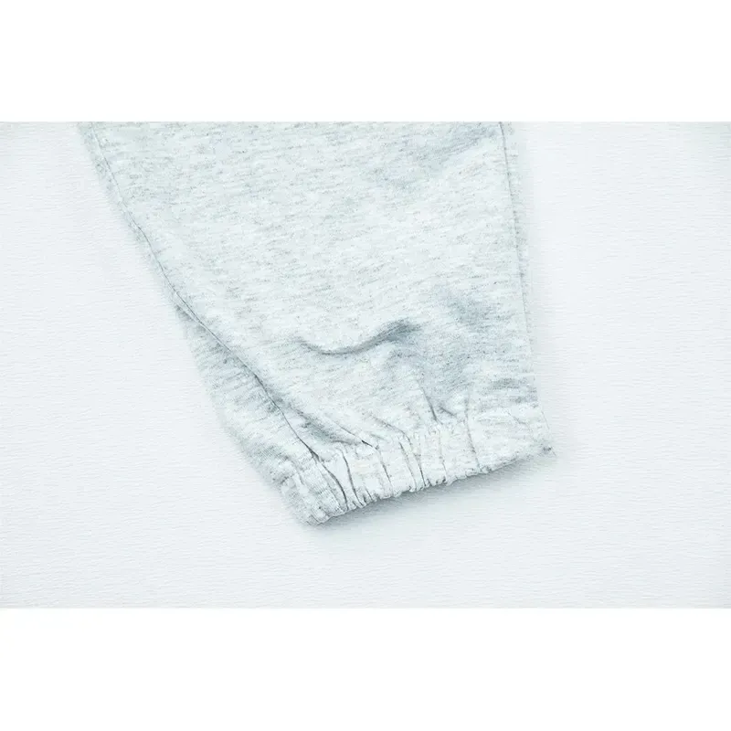 شلوار دخترانه ملانج طرح گربه مدل جاگر کمر کشی و دم پا کش